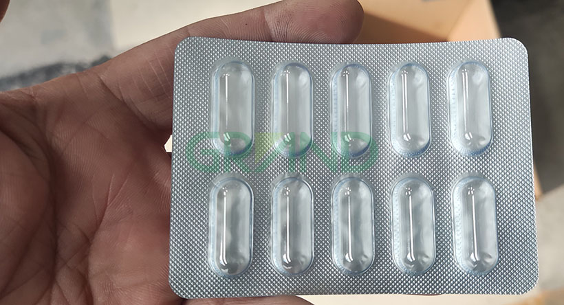 Machine d'emballage en cloque pour capsule